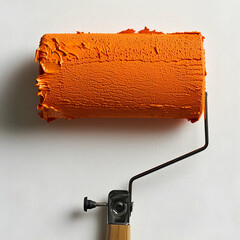 Obraz premium Close-Up of a Paint Roller Coated with Bright Orange Paint
