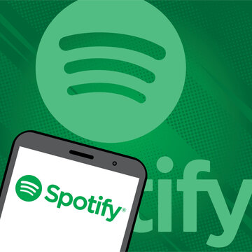 In this illustration the Spotfy logo is displayed on a smartphone screen and in the background. Stockholm, Sweden-06.25.2024