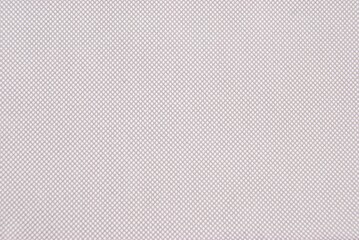 A sheet of brown dotted craft paper as background