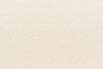 Beige cotton twill fabric pattern close up as background