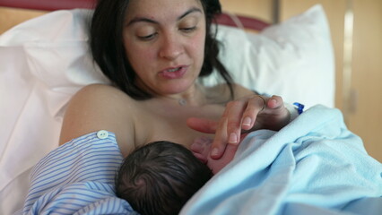 New Mother Bonding with Newborn at Hospital Post-Birth - Tender Breastfeeding Moments in Clinical...