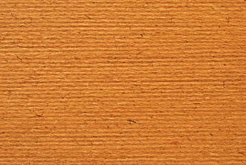 A sheet of creased brown recycled craft paper texture as background	