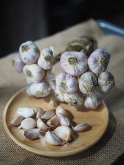 fresh garlic bundle and cooking in kitchen texture 