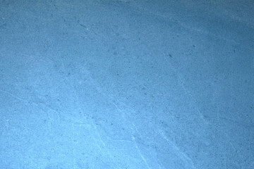 dark blue concrete background.