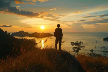 Man stay on hill on sunset. Thailand  Koh Chang  Klong Prao beach