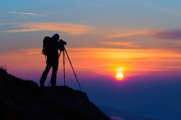 Silhoutte of a lone photographer at sunset