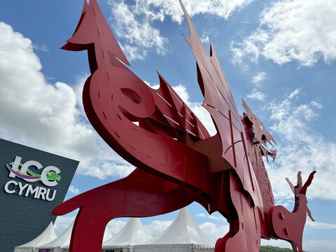 Newport, Wales, UK - 21 June 2024: Large red dragon public artwork outside the International Convention Centre at the Celtic Manor Resort