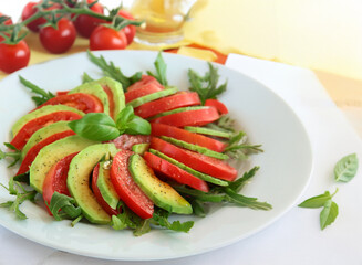 healthy eating avocado with tomatoes and basil