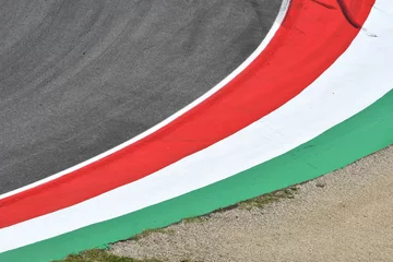 Fotobehang Formule 1 colored curb on a racing track  © Dan74