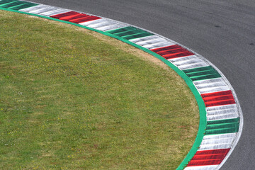 colored curb on a racing track