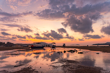 amazing pink sky in Dramatic Sunrise..dramatic sky with colorful clouds above fishing...