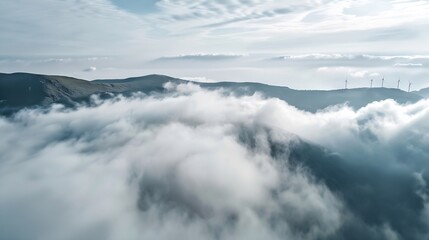 Aerial photography of mountain wind farm clouds and fog : Generative AI