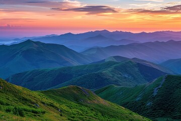 Fototapeta premium A majestic mountain vista at sunset, with the sky painted in hues of orange, pink, and purple, and the mountains