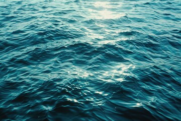 Sunlight shining  the surface and under the blue ocean  sea wave   with clean waters in summer time