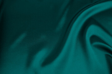 Green satin fabric as background