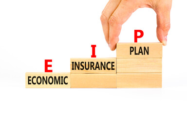 EIP economic insurance plan symbol. Concept words EIP economic insurance plan on beautiful wooden blocks. Beautiful white background. Business EIP economic insurance plan concept. Copy space.