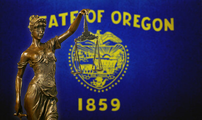 Fototapeta premium Lady Justice before a flag of Oregon