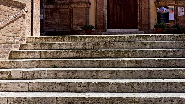 Tilt up-San Pietro alle Scale 12th century church in Siena, Italy, a Roman Catholic parish church located on via San Pietro, Terzo of Citt&agrave;, in Siena,  region of Tuscany, Italy