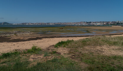 boat stranded at low tide in the bay of Santander