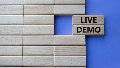 Live Demo symbol. Concept word Live Demo on wooden blocks. Beautiful purple background. Business...