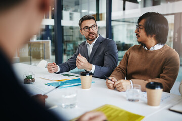 Discussion, planning and business people in meeting listening to ideas for sales growth in...