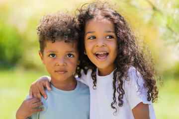 small mulatto children a boy and a girl on a summer walk