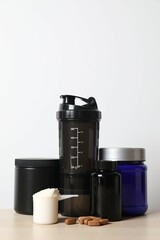 Sports nutrition and various supplements on the table