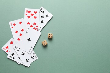 Playing cards on color background, top view. Gambling concept