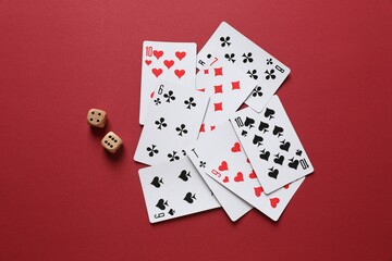 Playing cards on color background, top view. Gambling concept
