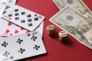 Fototapeta na wymiar Playing cards on color background, top view. Gambling concept