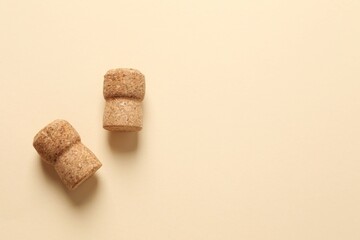 Corks of champagne on colored background