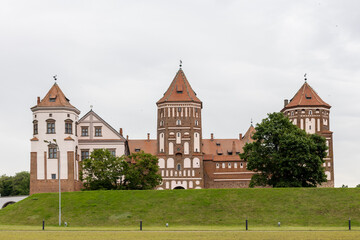 Fototapeta premium Mir Castle Complex in summer on a gloomy day