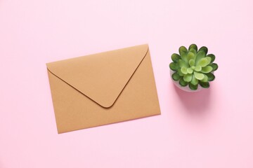 Сraft paper envelope  on color background 