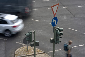 A traffic light at the intersection.