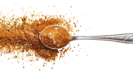Brown sugar in the spoon on transparent background