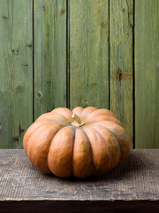 Winter Squash Musquee De Provence Pumpkin on an Old Wooden Table