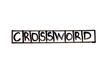 CROSSWORD word, text circled, written with a marker on the board. Crossword, concept.