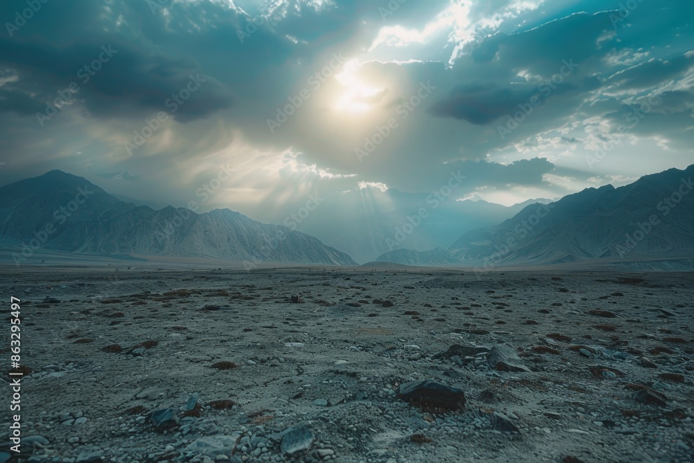 Poster a serene mountain scene with sunlight filtering through the clouds, perfect for use in travel or out
