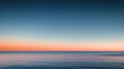 Obraz premium Serene Ocean Horizon at Sunset with Gentle Ripples.