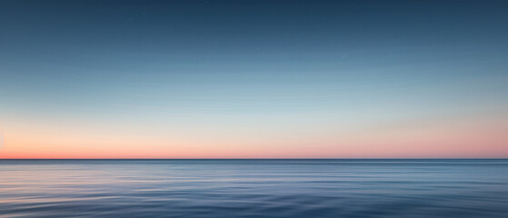Obraz premium Serene Ocean Horizon at Sunset with Gentle Ripples.