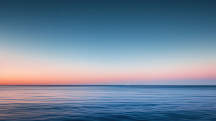 Obraz premium Serene Ocean Horizon at Sunset with Gentle Ripples.