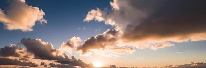 Serene Skyline: Clouds Bathed in Sunset Hues