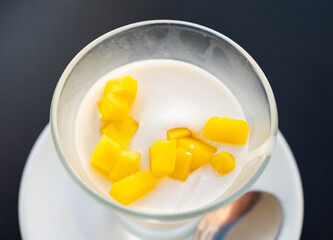 Delicious creamy mango mousse served for dessert in bowl