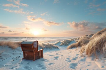 Fototapeta premium In a striped deckchair, sand dunes frame the sunset, and the colors of the sky are breathtaking.