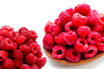 Fresh raspberry on white background.
