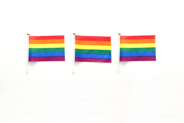 The multicolored LGBTQIA+ flag with the colors of the rainbow, which symbolizes gay pride and the...