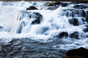 Beautiful waterfall in the mountains in untouched nature