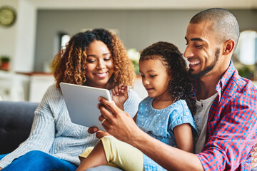 Tablet, happy family and child with parents in home together for learning, education or relax....