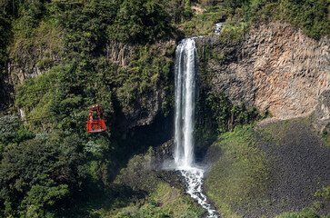 Obraz premium Manto de la Novia Waterfall and Tarabita Cable Car, Baños de Agua Santa, Tungurahua, Ecuador