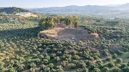 Aerial panoramic view of Sparta city with Taygetus mountains and ancient ruins remains in...